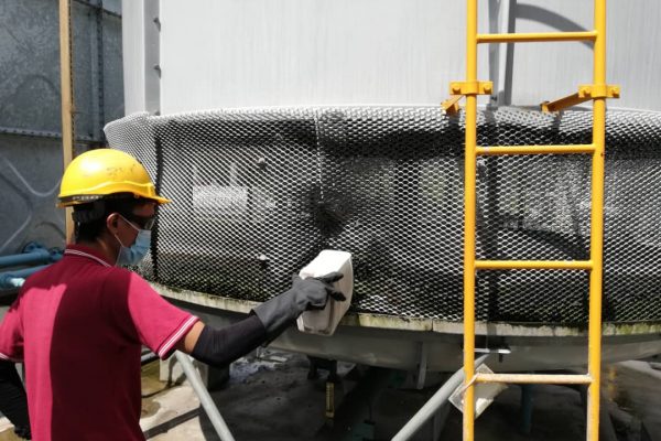 1.1 Pouring Chemicals Into Cooling Tower 600x400